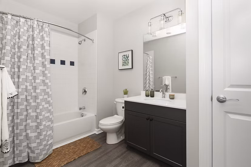 Bathroom featuring modern fixtures and sleek design in Pembroke Woods Apartments