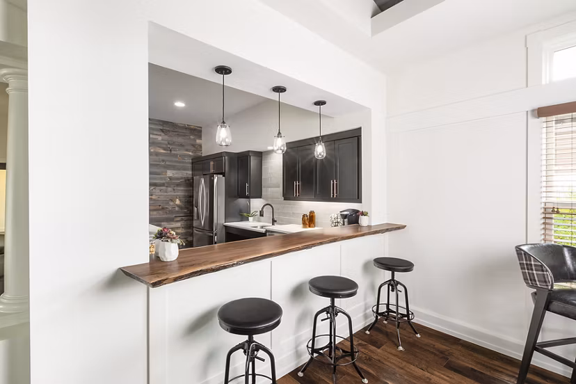 Clubhouse featuring modern design and communal seating at Pembroke Woods Apartments