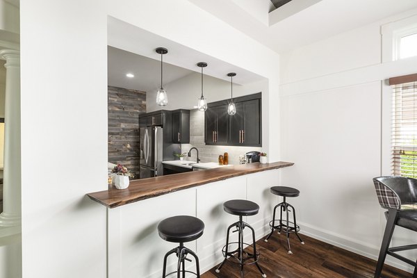 Clubhouse featuring modern design and communal seating at Pembroke Woods Apartments