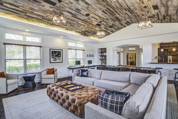 Clubhouse with stylish seating in Pembroke Woods Apartments' lobby
