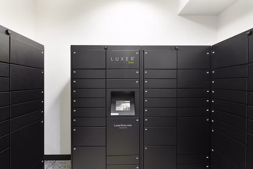 Parcel pickup service area at Pembroke Woods Apartments offering convenient package retrieval for residents