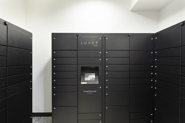 Parcel pickup service area at Pembroke Woods Apartments offering convenient package retrieval for residents