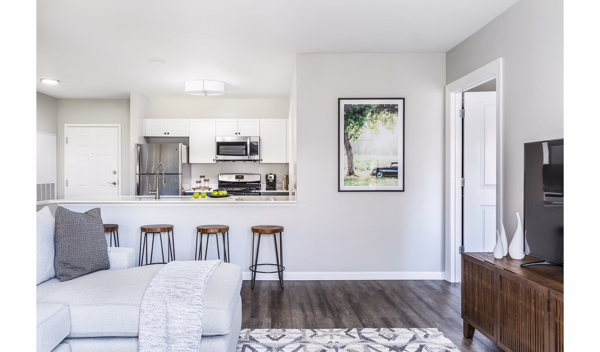 Dining room with modern furnishings in Pembroke Woods Apartments, featuring a sleek design and ample natural light for a luxurious living experience