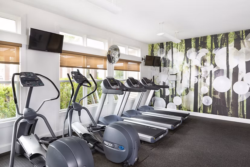 State-of-the-art fitness center featuring modern equipment at Pembroke Woods Apartments