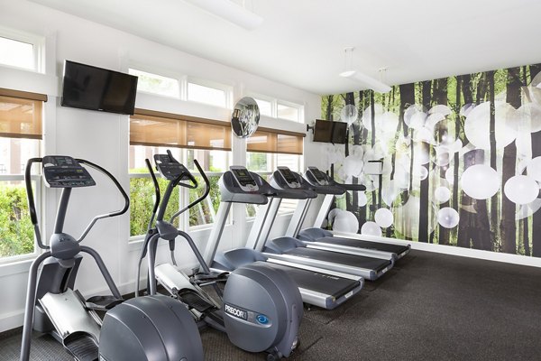 State-of-the-art fitness center featuring modern equipment at Pembroke Woods Apartments