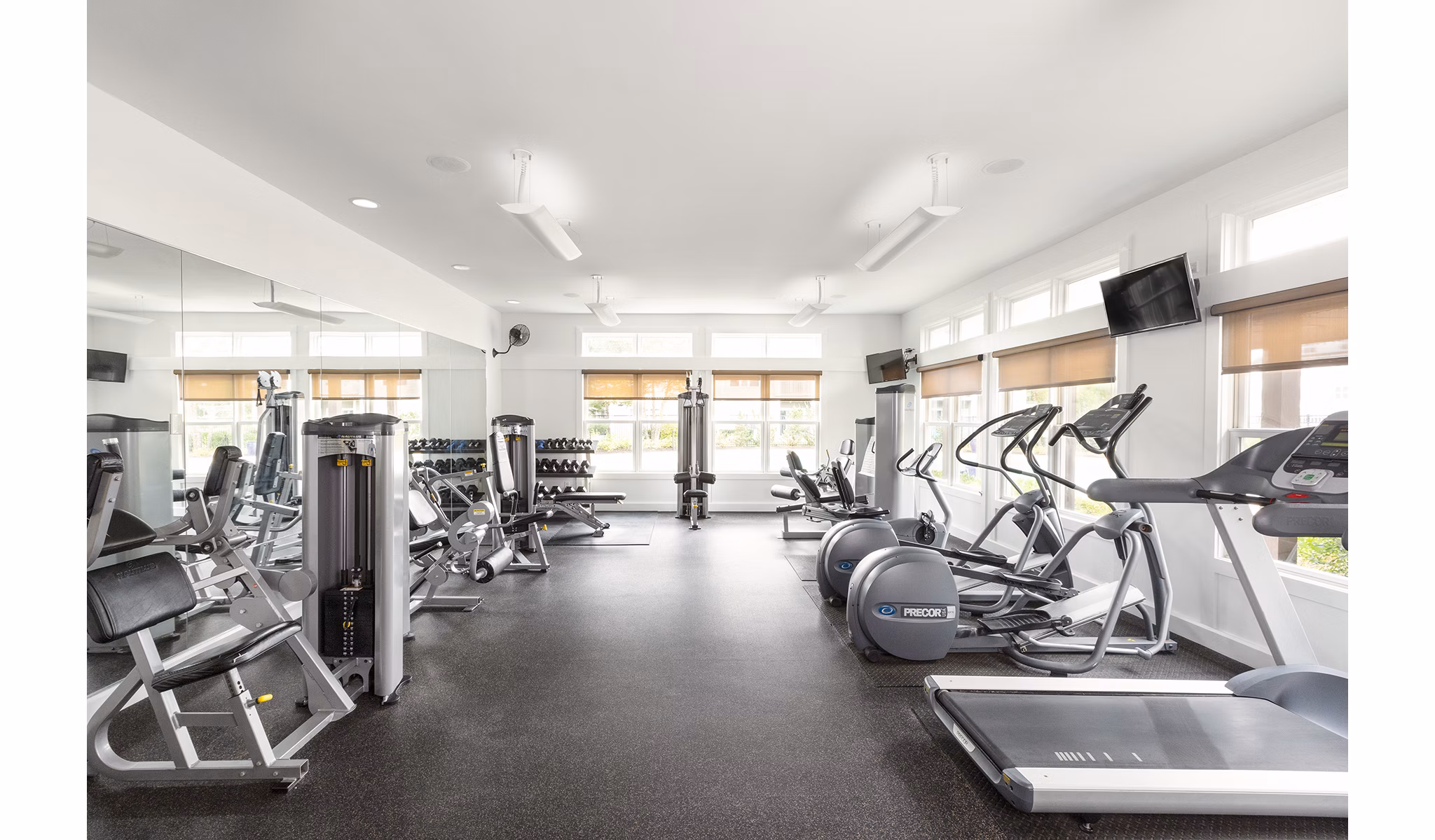 State-of-the-art fitness center with modern equipment at Pembroke Woods Apartments