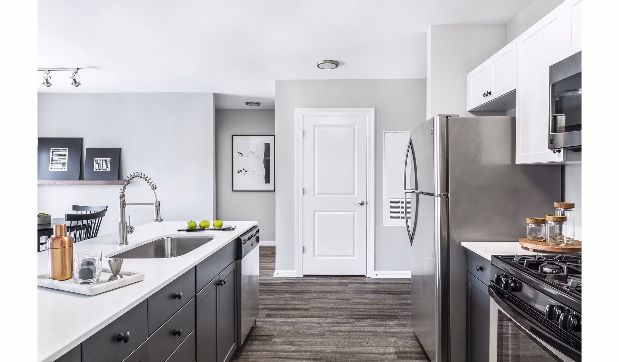 Modern kitchen featuring stainless steel appliances in Pembroke Woods Apartments