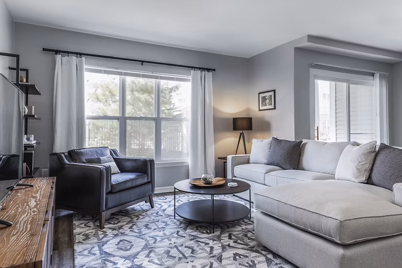 Cozy living room with modern decor at Pembroke Woods Apartments