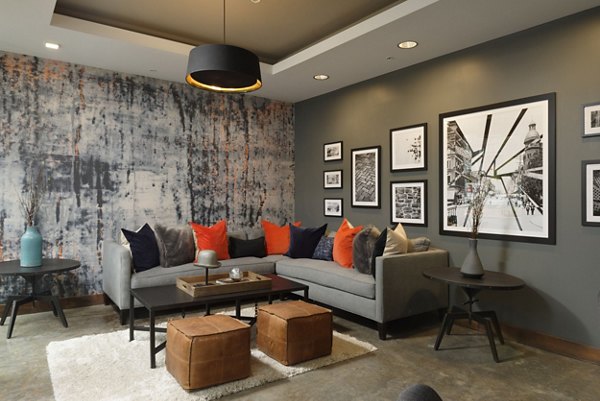 Clubhouse with modern design and cozy seating at The Aspen Apartments