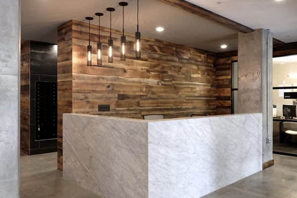 Clubhouse featuring luxury design and spacious seating at The Aspen Apartments in Greystar community