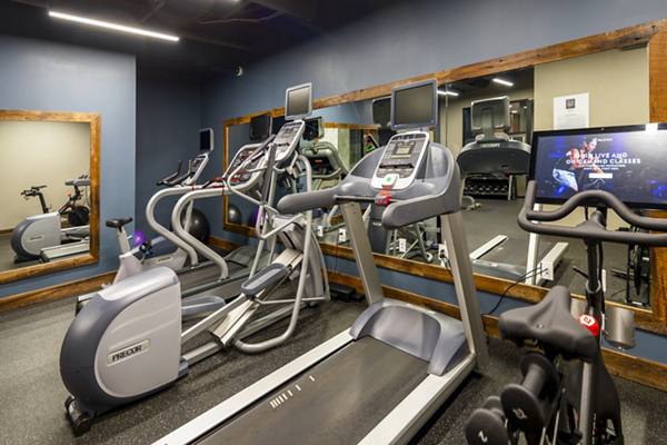 fitness center at The Aspen Apartments