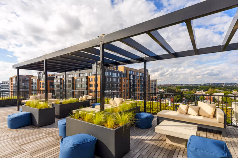 Scenic patio with seating area at The Aspen Apartments