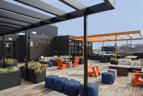 Rooftop patio with scenic mountain views at The Aspen Apartments