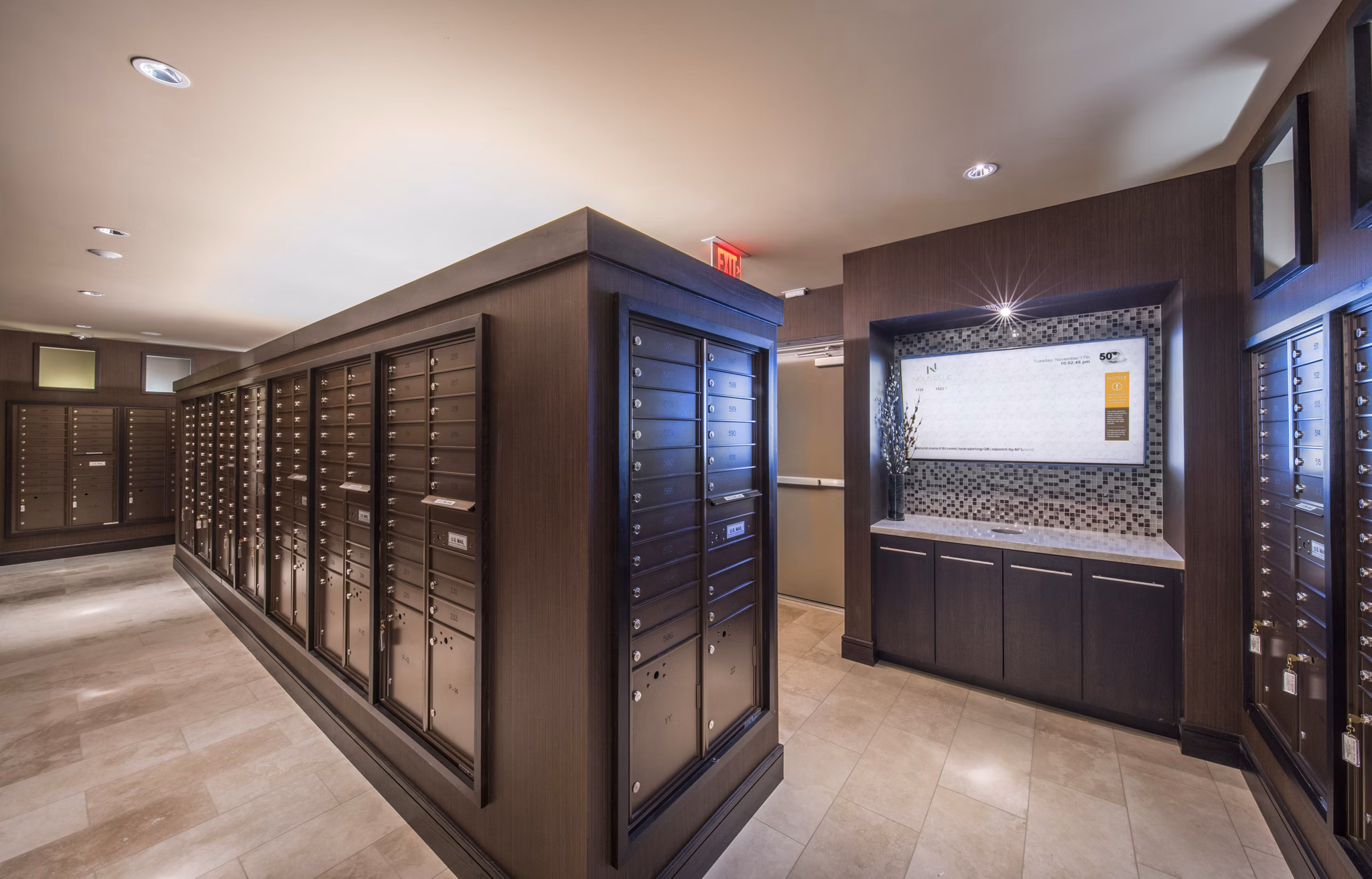 Mail room with secure package lockers at Nouvelle Apartments