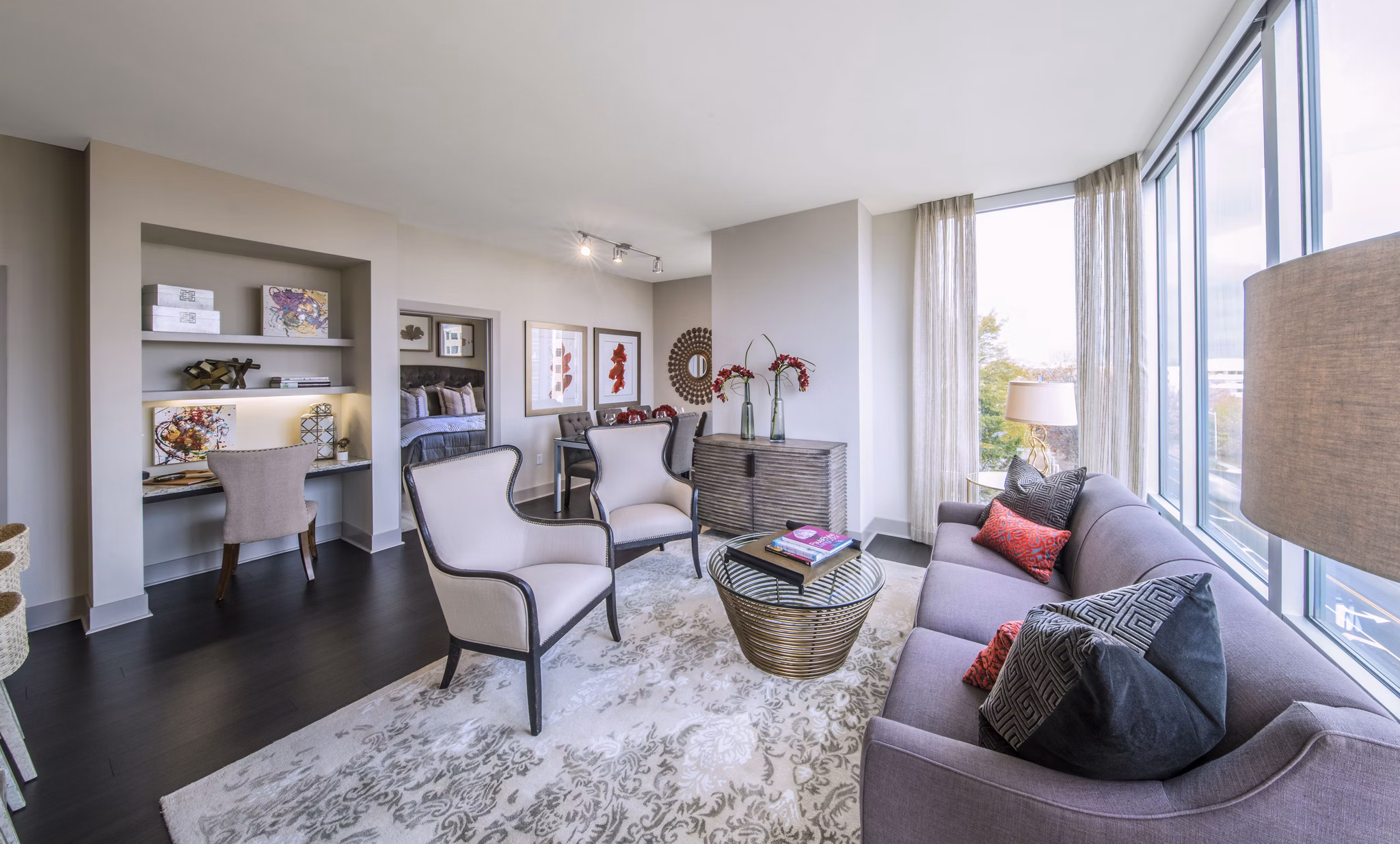 Spacious living room with modern decor at Nouvelle Apartments