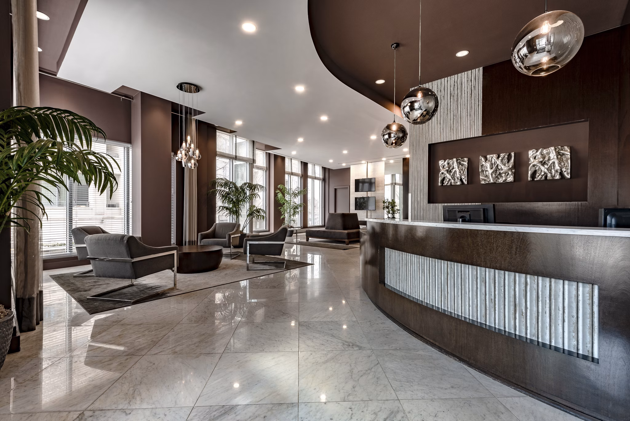 Clubhouse with modern decor and open seating at The Lofts at Park Crest Apartments