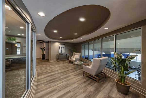 Clubhouse at The Lofts at Park Crest apartments featuring modern design and upscale amenities Perfect for socializing and events