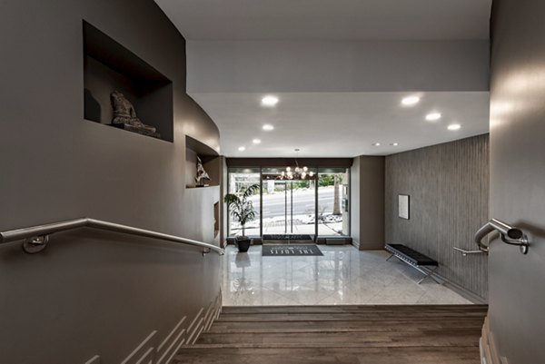 Modern clubhouse with chic decor and open layout at The Lofts at Park Crest Apartments