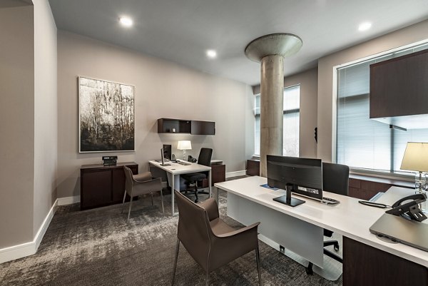 Modern clubhouse featuring stylish seating and entertainment areas at The Lofts at Park Crest Apartments