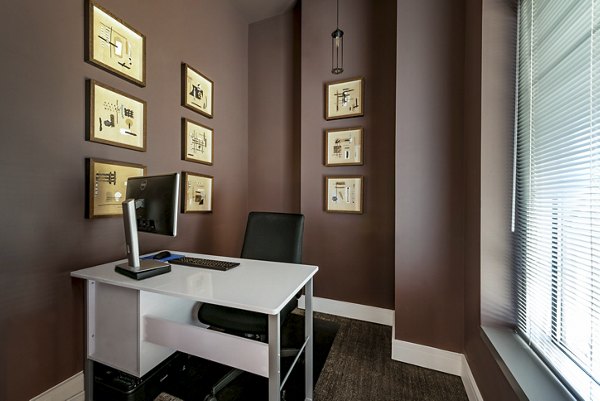 Clubhouse with modern design features at The Lofts at Park Crest Apartments, a luxury community