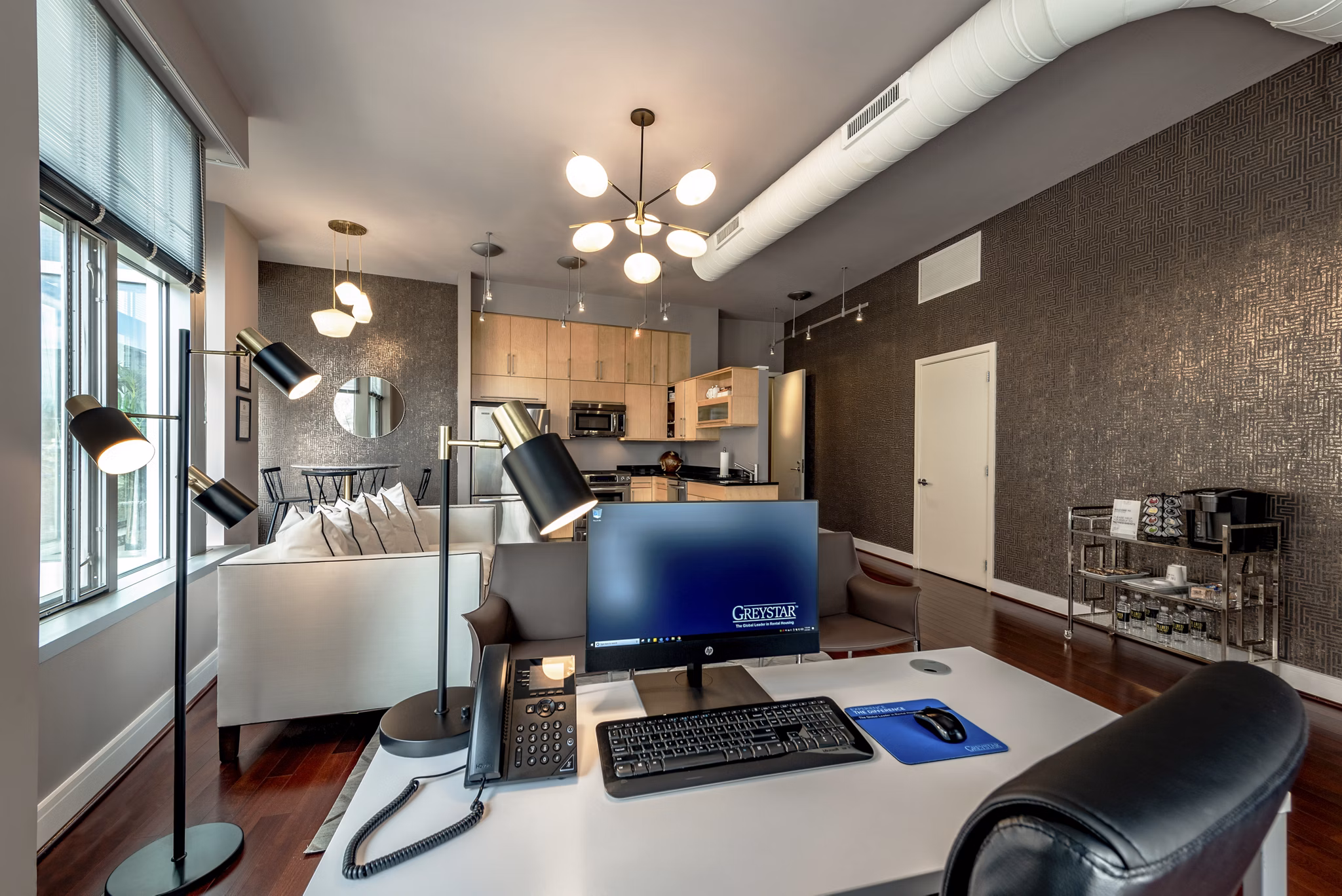 Clubhouse interior with modern design and plush seating at The Lofts at Park Crest Apartments