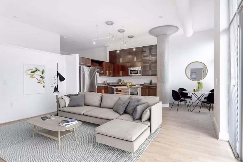 Stylish living room with modern furnishings in The Lofts at Park Crest Apartments, offering premium luxury accommodations in a welcoming environment