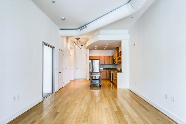Stylish living room with modern furnishings in The Lofts at Park Crest Apartments, offering premium luxury accommodations in a welcoming environment