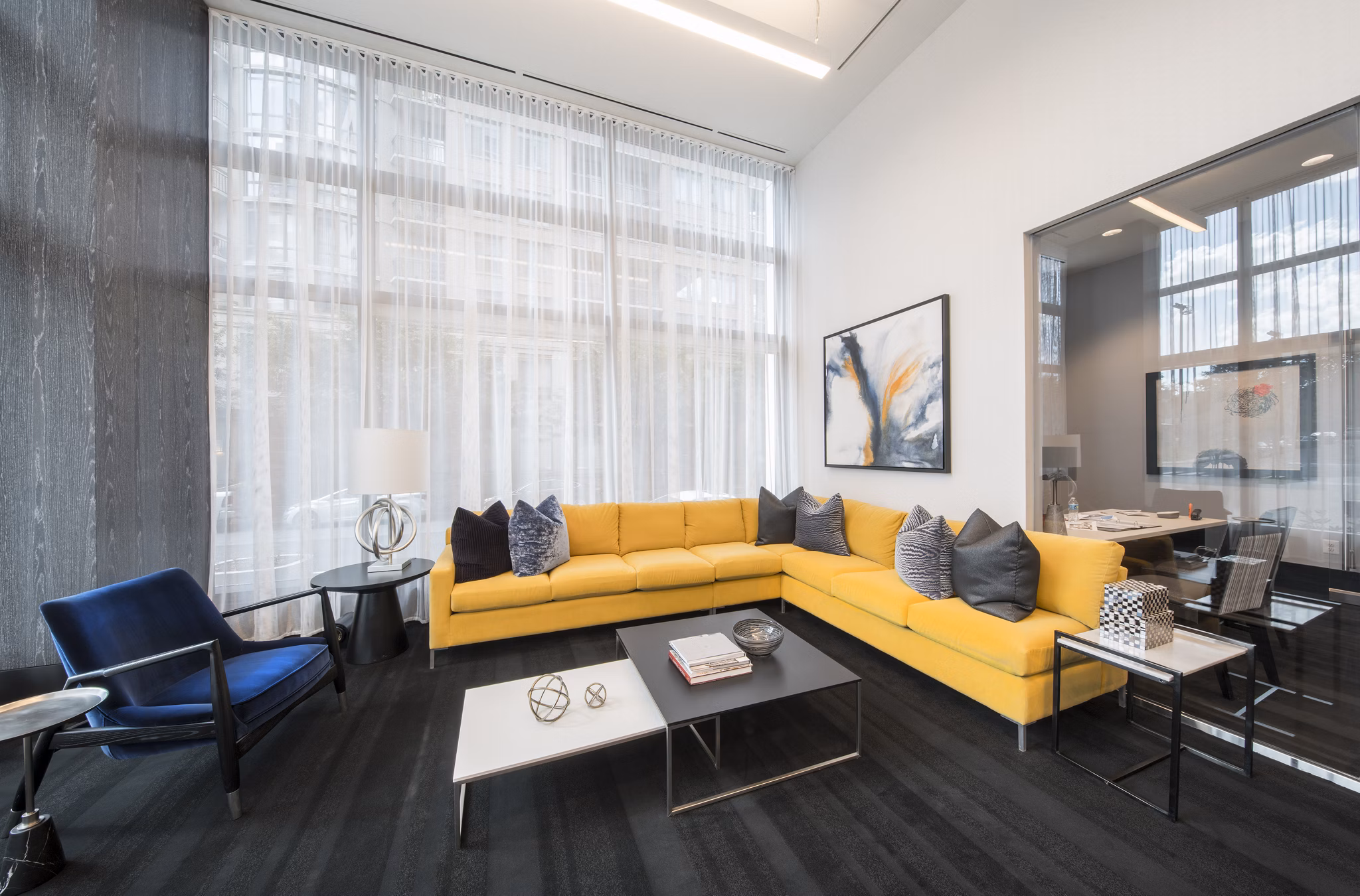 Clubhouse featuring contemporary design at Latitude Apartments offering engaging social spaces and modern amenities for residents