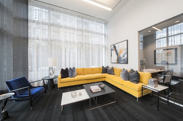 Clubhouse featuring contemporary design at Latitude Apartments offering engaging social spaces and modern amenities for residents