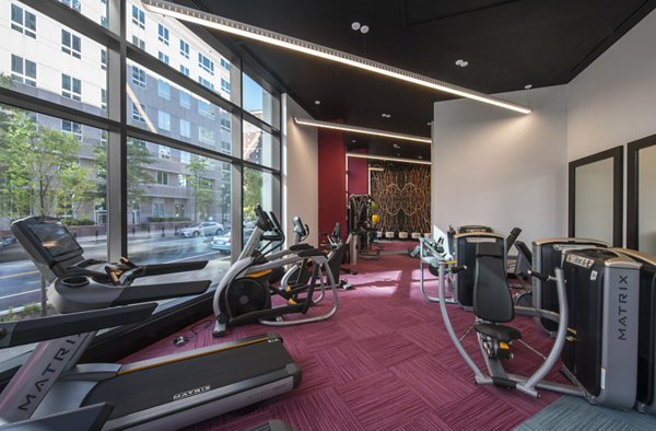 State-of-the-art fitness center at Latitude Apartments with modern equipment and ample space for workouts