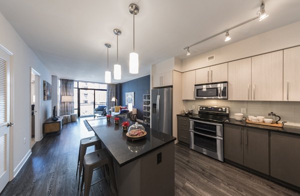 Modern kitchen with stainless steel appliances in Latitude Apartments, Greystar's luxury living community