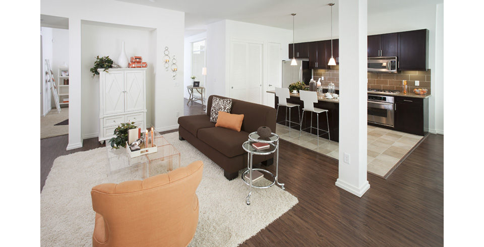 Cozy living room with modern furnishings at Forty55 Lofts in Los Angeles