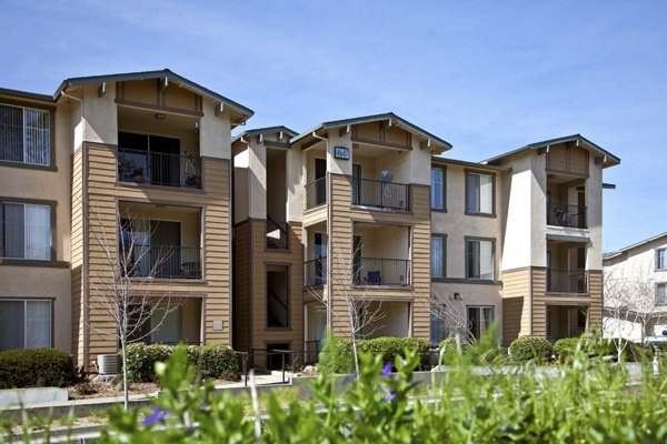 Acacia on Santa Rosa Creek: Scenic view of modern luxury apartments nestled by the creek in California