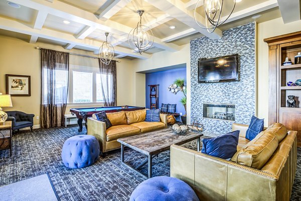 Clubhouse lobby with modern design and cozy seating at Acacia on Santa Rosa Creek Apartments, offering luxury living spaces