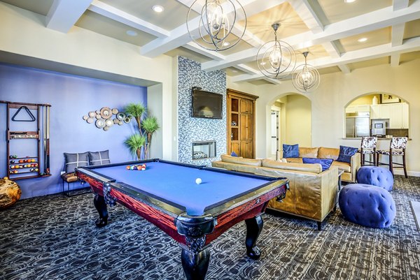 Game room with pool table and arcade games at Acacia on Santa Rosa Creek Apartments, luxury apartments with modern amenities