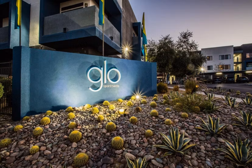Stylish signage at Glo Las Vegas Apartments entrance, highlighting luxury apartment living in Las Vegas
