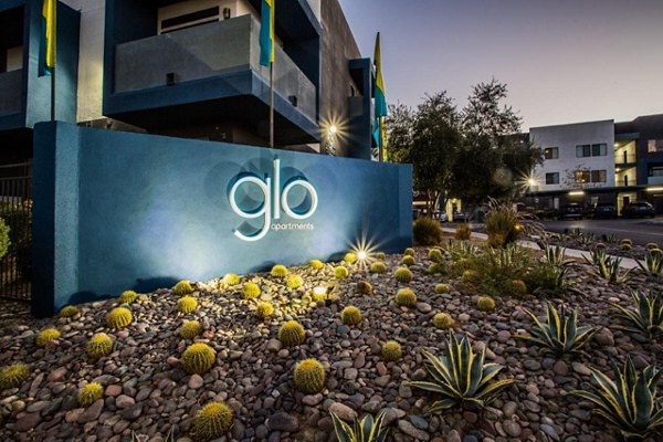 Stylish signage at Glo Las Vegas Apartments entrance, highlighting luxury apartment living in Las Vegas