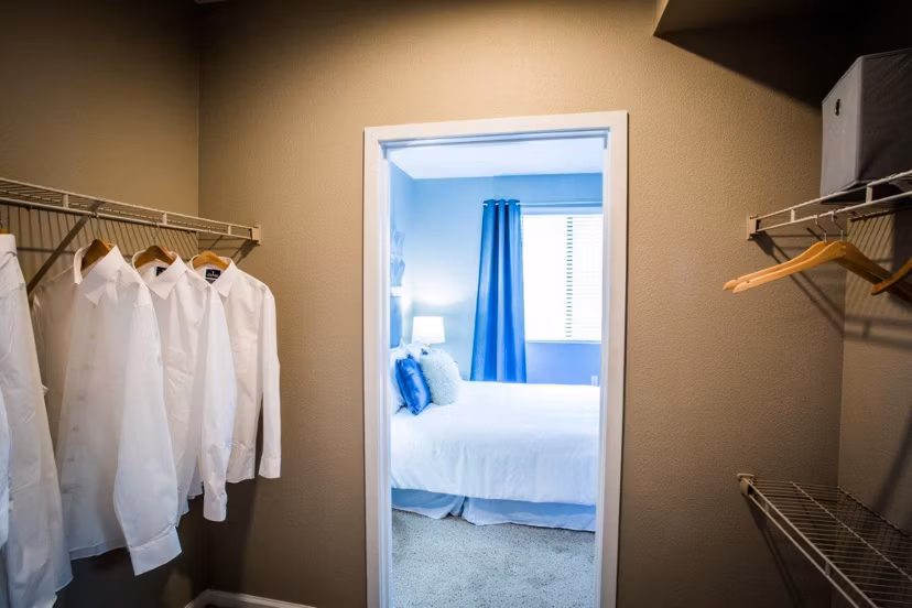 Walk-in closet with ample storage space at Glo Las Vegas Apartments, enhancing luxury living experience