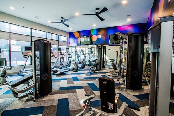 State-of-the-art fitness center with modern equipment at Glo Las Vegas Apartments for luxurious living