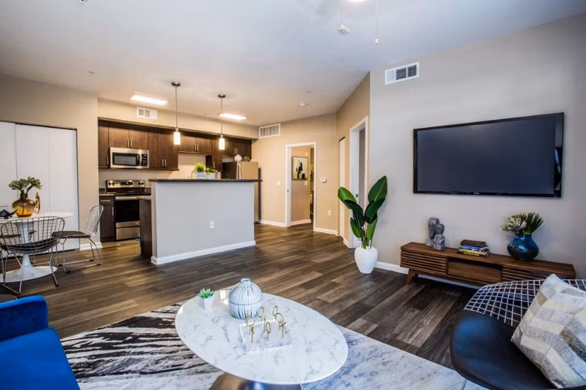 Spacious living room with modern decor at Glo Las Vegas Apartments
