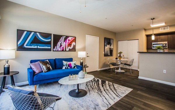 Spacious living room with modern decor in Glo Las Vegas Apartments