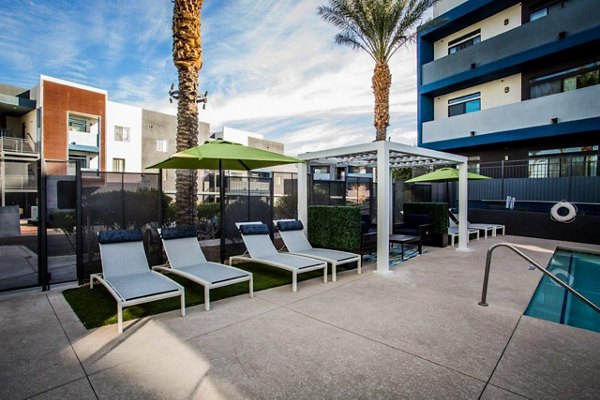 Luxe poolside retreat at Glo Las Vegas Apartments with cabanas and city views