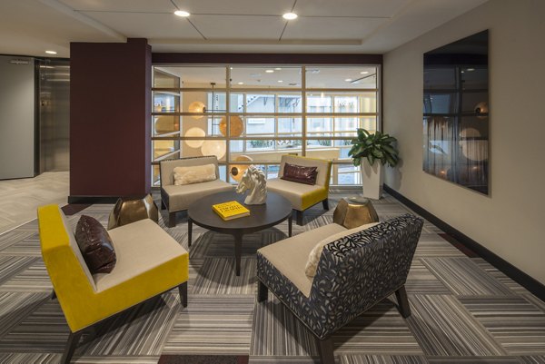 The Desmond Apartments: Stylish clubhouse with modern decor in luxury community