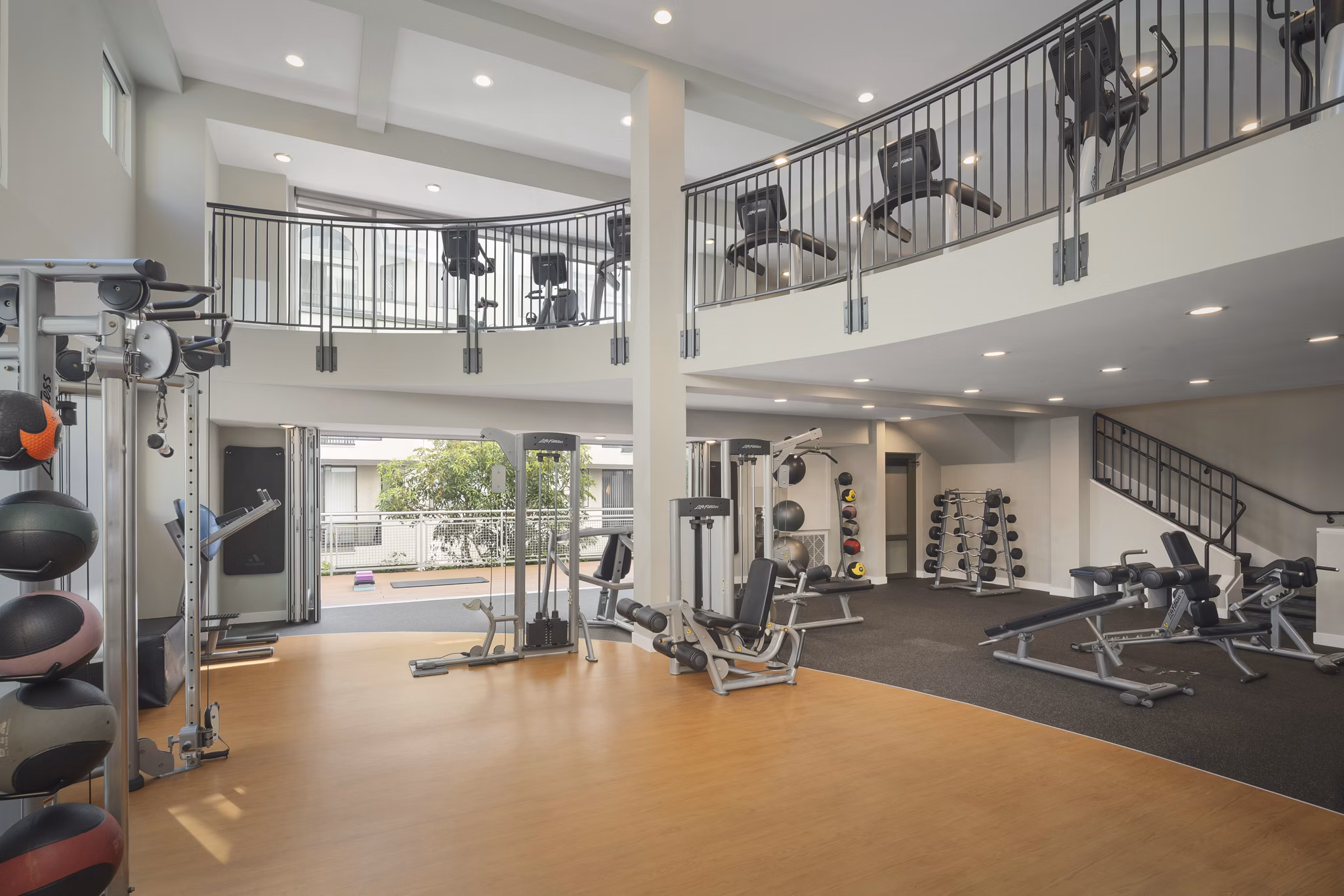 fitness center at Desmond at Wilshire Apartments 