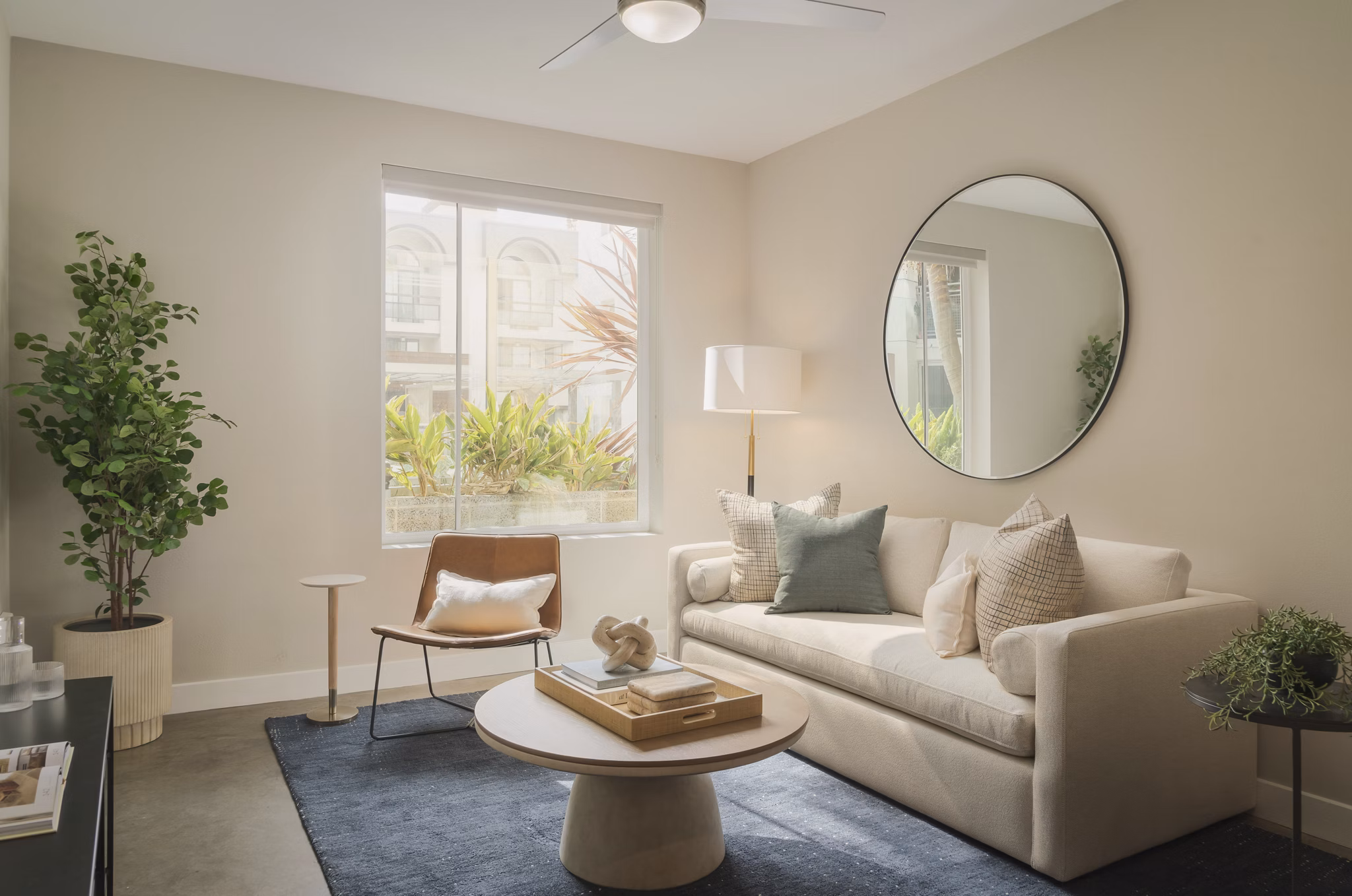living room at Desmond at Wilshire Apartments 