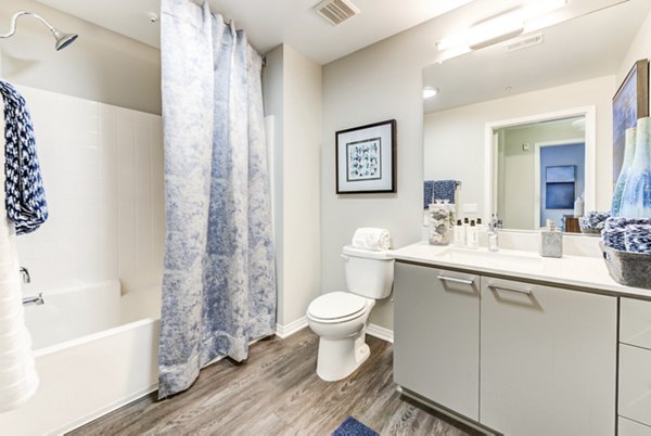 Modern bathroom with sleek fixtures at The Gallery at NoHo Commons Apartments, offering luxury living in a convenient North Hollywood location