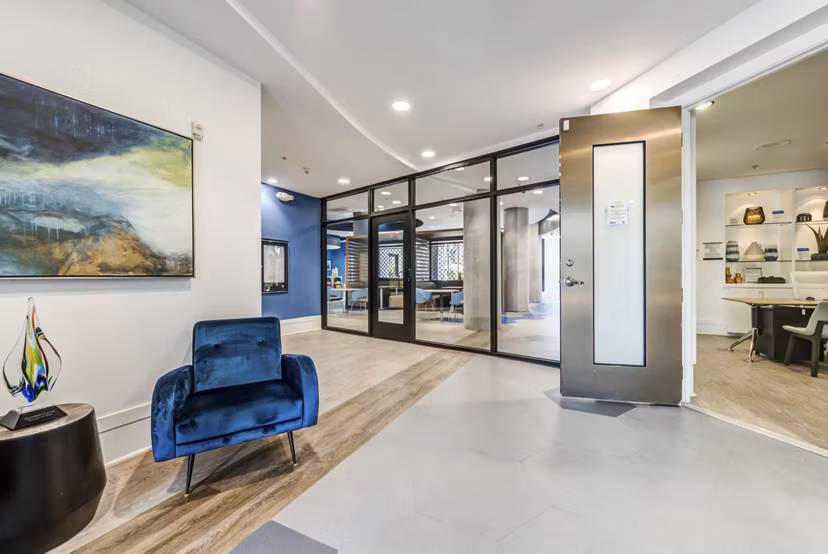 Clubhouse with modern design and seating areas at The Gallery at NoHo Commons Apartments Perfect for social gatherings and community events