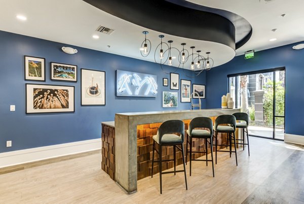 Clubhouse featuring elegant design and modern furnishings at The Gallery at NoHo Commons Apartments