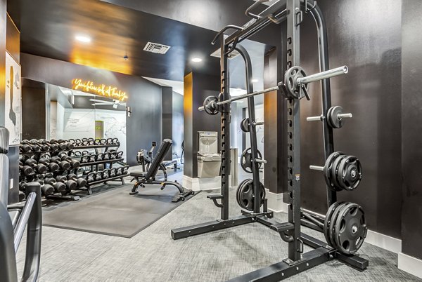 Modern fitness center with state-of-the-art equipment at The Gallery at NoHo Commons Apartments