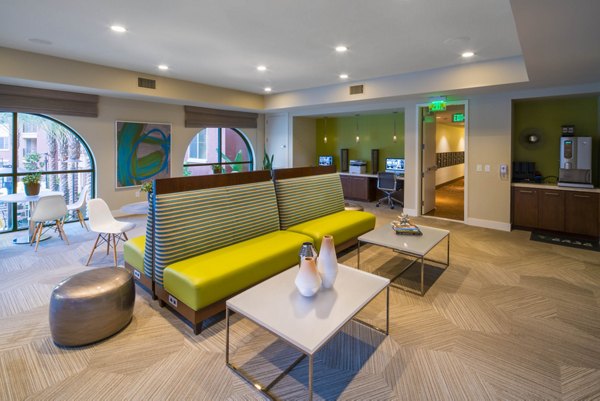 The Verge Apartments: Stylish clubhouse featuring modern design and comfortable seating in a vibrant community